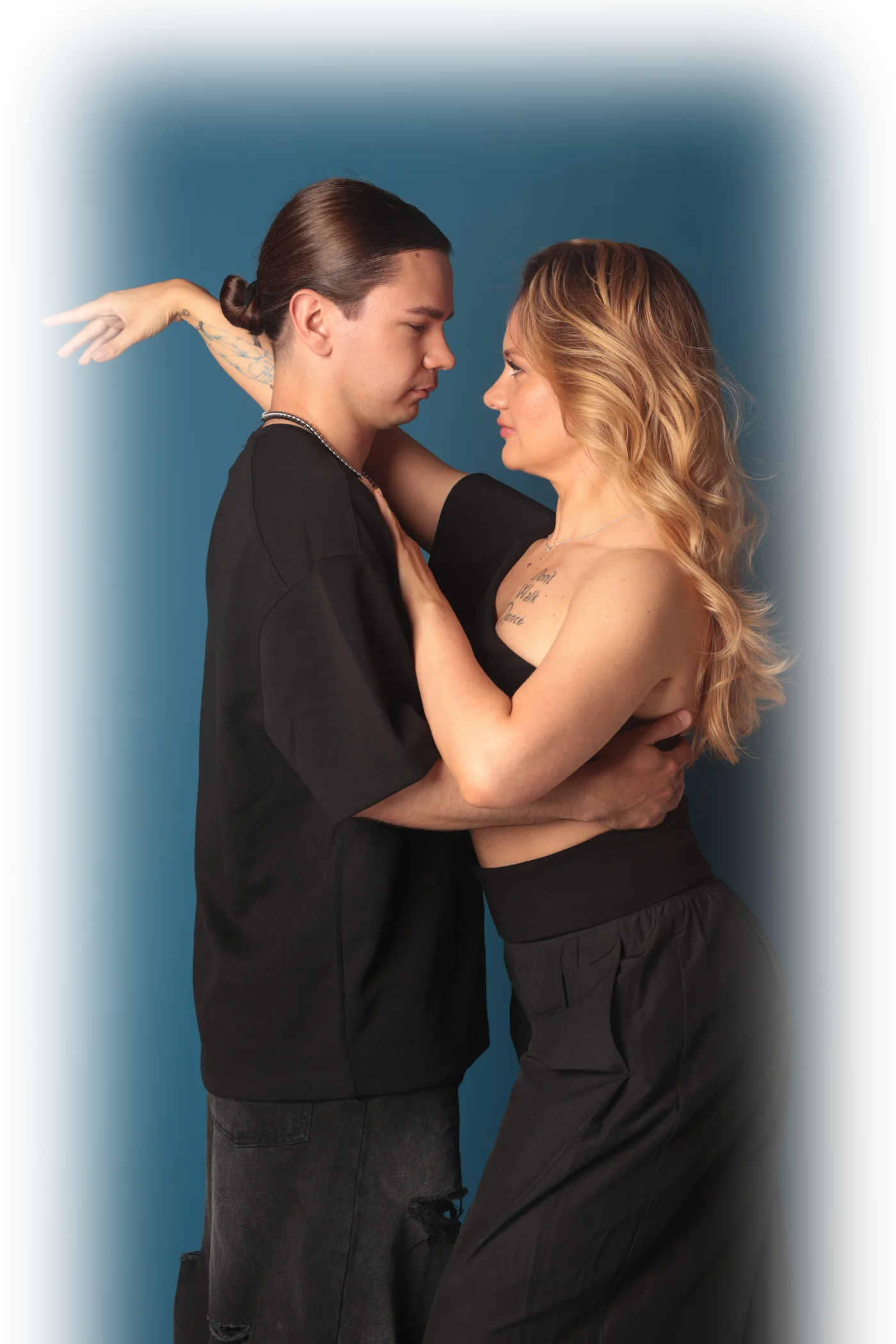 Robert and Kira in a bachata dance frame